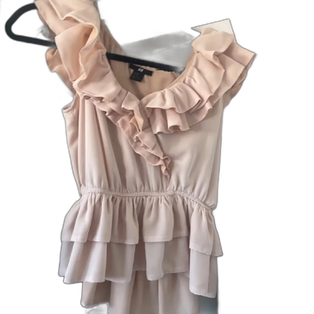 Ljusrosa volangblus från H&M