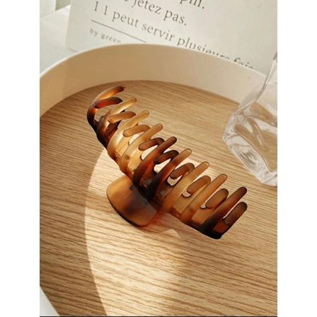 1 Stor Amberfärgad Hårklämma 11x5 cm.