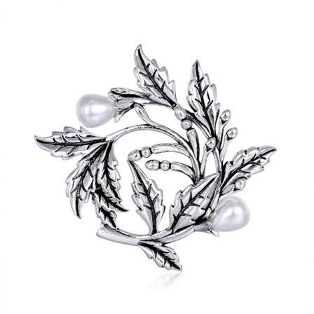 Håndlaget brosje med kulturperler fra Bali