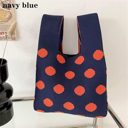 Neulotut käsilaukut Knot rannelaukku NAVY BLUE