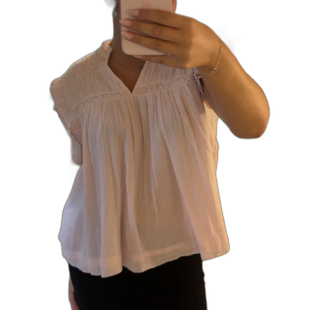 Ljusrosa blus med volangärmar
