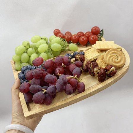 Morsom mattallerken i tre Kjøkken Husholdningssnacksrett Aperitiff Vintallerken