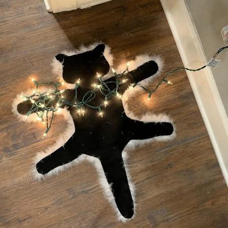 Ljus upp stekt kattrugga rolig julbelysning dekoration golv moster Bethany's stekta kattungerugga från National Lampoon's roliga dekor Warm Light