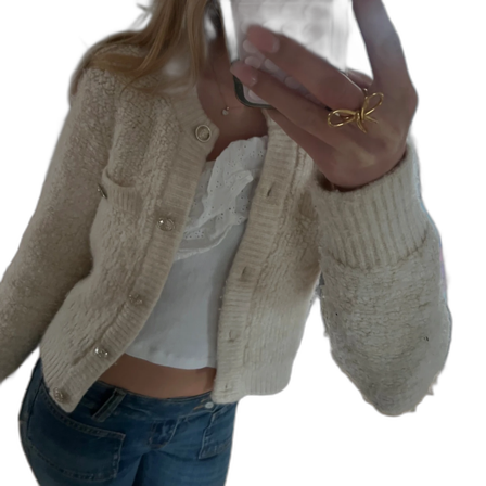 Krämvit kofta med knappar