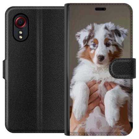 Kompatibelt Plånboksfodral till Samsung Samsung Galaxy Xcover 5 Söt hundvalp - Fluffig valp med blå ögon i närbildsporträtt