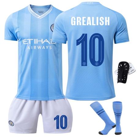 23/24 Mestarien liigan painos Manchester City jalkapallopaitasetti sukkien ja suojavarusteiden kanssa 10 GREALISH barnstorlekar28