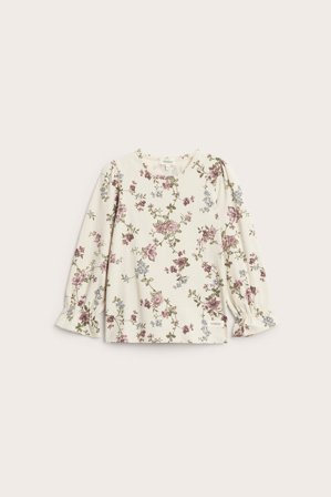 Newbie | Blomstrete topp med puffermer | Lys beige