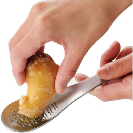 Lusikkamainen ruostumattomasta teräksestä valmistettu inkivääriraastin wasabi-valkosipulin jauhamiseen