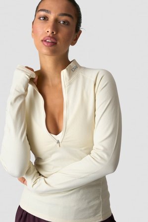 ICANIWILL - Define Thermal Seamless 1/2 Zip LS Cream - Dames - sportkleding van ICIW