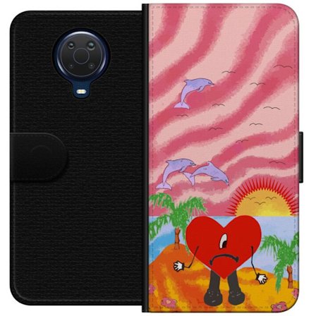 Kompatibelt Lommeboketui til Nokia G20 Bad Bunny i en fargerik quiltet jakke med hjertemønster og solbriller i moderne gatestil