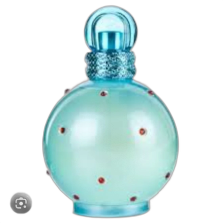 Parfym i blå flaska med röda stenar