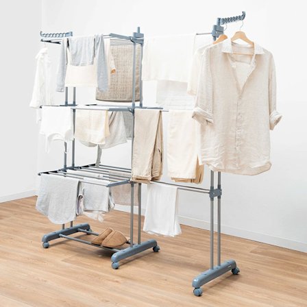 Kokoontaitettava kuivausteline, jossa on ulosvedettävät ripusti