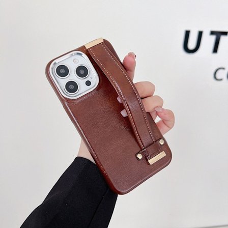 Etui til iPhone 16plus mørkebrunt vokset lær armbånd anti-fall fullage og metallrin