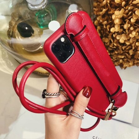 iPhone 15 -kotelo punaisella kaulanauhalla, trendikäs merkki, internet-julkkis, nahkainen vibrato-ranneke