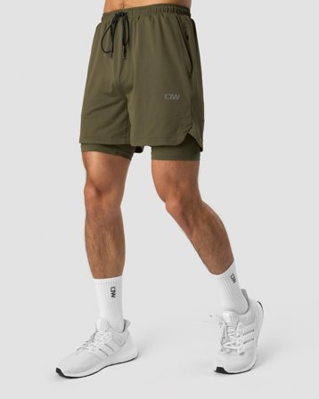 ICANIWILL - Stride 2-in-1 Shorts Men Dark Green - Shortsit - Miehet - Treenivaatteet ICIW:ltä