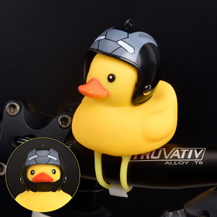 Vindbrytande anka vägcykelklocka Liten anka gul ankhjälm Barn som cyklar med hjälmhornljus