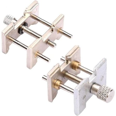 Kelloliikkeen pidikesetti 2-in-1 käännettävä metallikellotehtaan puristimen korjaustyökalu 2 kpl teollisuusvälineitä