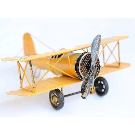 Retro keltainen taottu rauta retro potkurimalli lentokone