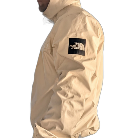 Beige vindjacka från The North Face