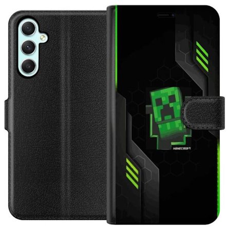 Kompatibelt Plånboksfodral till Samsung Galaxy A34 Minimalistisk grön Creeper-figur i pixeldesign med futuristisk techbakgrund och geometriska forme