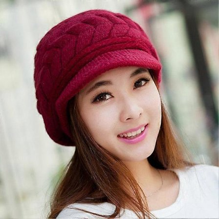 Varm strikket vinterlue i ull for kvinner med brem