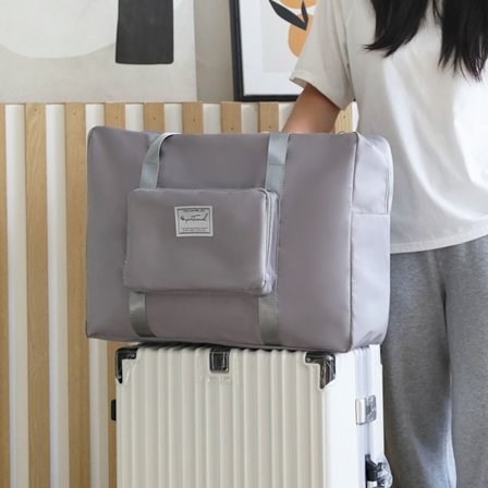 Matkalaukku Laukko Suurikoikan kokoontaittuva matkalaukku HARMAA - spot-myynti