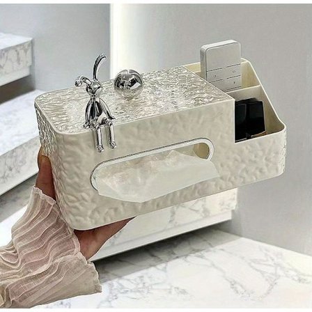 En multifunktionell skrivbordsförvaringslåda som kan användas som en vävnadslåda, en fillåda eller ett förvaringsställ för andra diverse föremål.