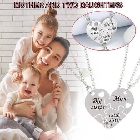 Halsband med pusselstycken i rostfritt stål och personliga hjärtberlocker med namn