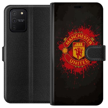 Kompatibelt Lommeboketui til Samsung Samsung Galaxy S10 Lite Manchester United logo i rød og gul farge med røff sportslig bakgrunn