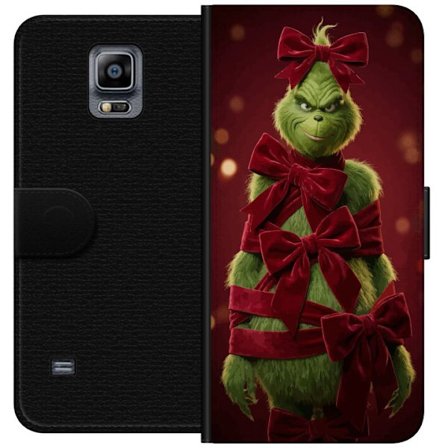 Kompatibelt Lommeboketui til Samsung Samsung Galaxy Note 4 Grinchen figur dekorert med røde fløyelsbånd i en festlig studioinnstilling med leken og