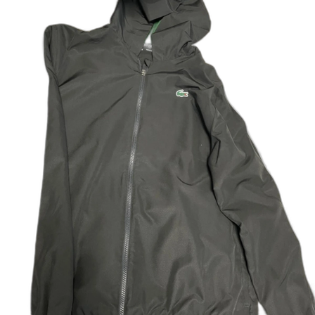 Svart tracksuit från Lacoste