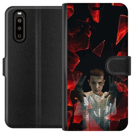 Kompatibelt Lommeboketui til Sony Xperia 10 II Overnaturlig jente med telekinetiske krefter og svevende røde glasskår i en dramatisk scene