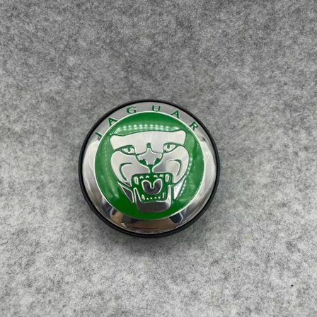 4 kpl J01 - 59MM 4-pakkauksen keskiöpeitteet Jaguar Hopea yksi koko