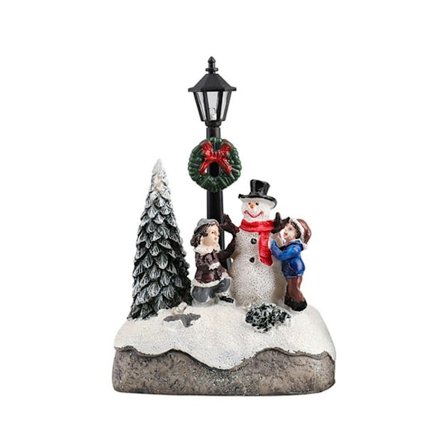 Hehkuva joulukylän joulukuusitalo A A