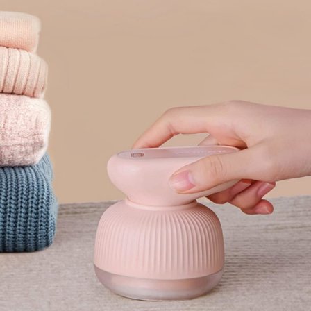 En flicka pulver noppborttagare, klädnoppsborttagare, tygnoppsbortta[CO]