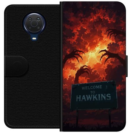 Kompatibel Tegnebogsetui til Nokia G20 Mørk apokalyptisk fantasy scene med brændende himmel og Hawkins-skilt i Stranger Things-stil