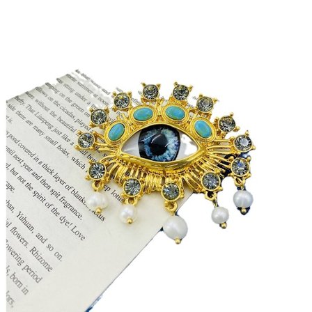 Djävulens öga guldpläterad koppar feminin brosch