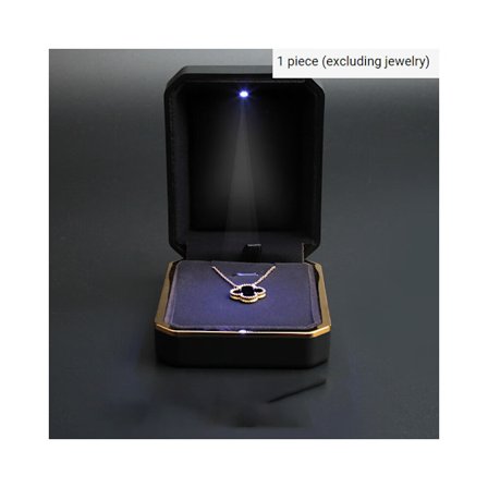 Yksi (musta, noin 9*7*3,5 cm) LED-korurasia valoilla, riipus