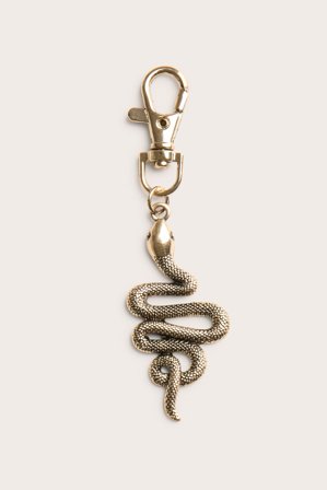 Kappahl | Slangeformet anheng i metall | Gull