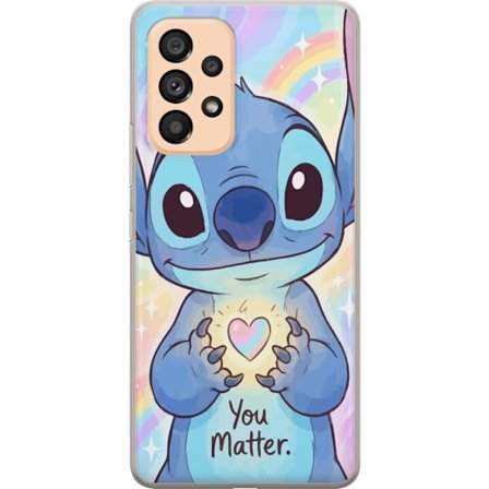 Kompatibel Mobilcover til Samsung Galaxy A53 5G Sød blå fantasy figur med store glossy øjne der holder et skinnende hjerte mod en regnbue baggrund i e