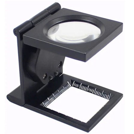 Svart hopfällbar förstoringslupp i metall med lins